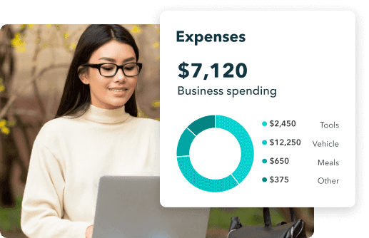 Laptop and mobile showing QuickBooks software